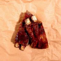 Bbq Smoked Pork Ribs · Fall-off-the-bone pork ribs covered in our delicious barbecue sauce.