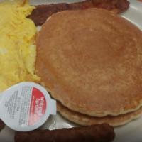 Pancake Platter · Two golden pancakes sided by two crisp pieces of bacon, two sausage links and two eggs, any ...