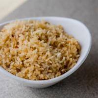 Basmati Rice · Basmati rice with a vegetable base seasoned with Dino’s original Greek seasoning, parsley, o...