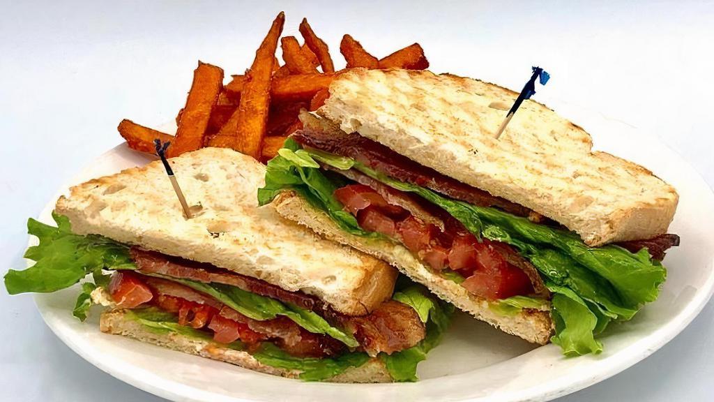 Ultimate Blt · (GF available) Four slices of bacon, lettuce, and thick-cut tomatoes on toasted sourdough with mayo.
