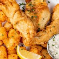 Walleye Fish And Chips · Cold-water walleye fillets with housemade lemon-scallion tartar sauce.