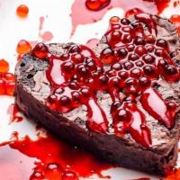Bleeding Heart Brownie · (GF) Gonzo artist Ralph Steadman inspired this brownie with Raspberry juice caviar splatters...