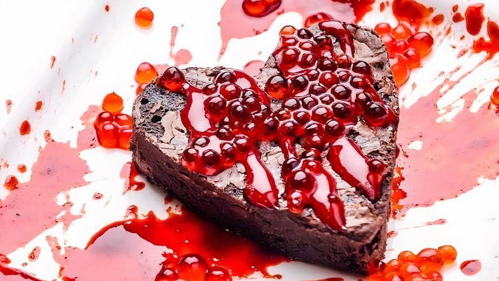 Bleeding Heart Brownie · (GF) Gonzo artist Ralph Steadman inspired this brownie with Raspberry juice caviar splatters that feel like tiny explosions in your mouth. Made with gluten-free rice flour.
