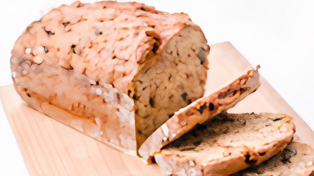 Sausage Bread Loaf (3Lb) · Our  deliciously dense bread made with sausage, toasted walnuts, black currants, spices, and black coffee has a devoted following, and now you can bring home a ready-to-bake loaf for yourself!