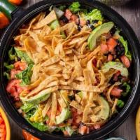 Southwest Chopped Salad · Grilled chicken breast, avocado, romaine, bacon, Chihuahua. cheese, corn, black beans, and d...