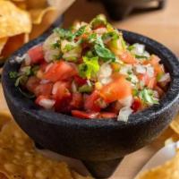 Chips & Pico · Pico is a traditional Mexican salsa made of fresh jalapeños, onion,. and tomato, prepared in...