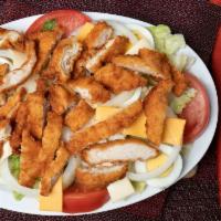 Chicken Strip Salad · Fried chicken strips, lettuce, tomato, boiled eggs, swiss and american cheese.
