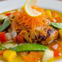 Red Curry · Red curry with coconut milk, eggplant, bell peppers, string beans, carrots and basil.
