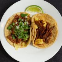 Taco Dinner · Choice of meat: carnitas, steak, chorizo, chicken, al pastor, or ground beef. Three tacos se...
