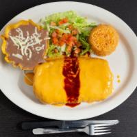 Chimichanga Burrito · Deep fried burrito filled with your choice of meat (steak, al pastor, chicken, ground beef, ...