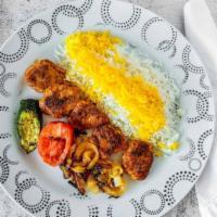 Blackened Chicken · Double breast of chicken, seasoned with 14 different spices. Served with grilled vegetables ...
