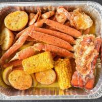Beach Feast · One pound of crab legs, half pound of shrimp, two lobster tails, corn, and potatoes.