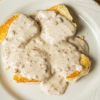 Biscuits And Gravy · 2 biscuits topped with sausage gravy.
