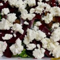 Greek Salad · A blend of fresh cut romaine and iceberg lettuce, croutons, red onions, olives, beets, cucum...
