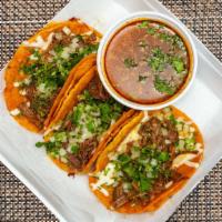 Taco · Corn or flour tortillas served with your choice of meat and toppings