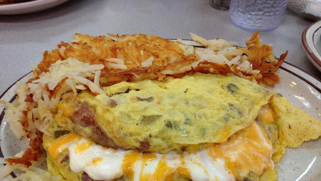 Rachel'S Omelette · Ham, Sausage, Bacon, Green peppers, Tomatoes, Onions & Cheese