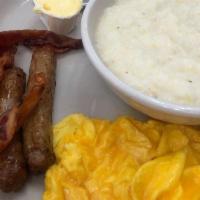 2 Eggs · 4 turkey sausage or 4 turkey bacon and a choice of grits or hash browns and toast