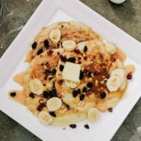 Harry'S Pancake Supreme · 1 large pancake with bananas, pecans, blueberries and topped with strawberry sauce and whipp...