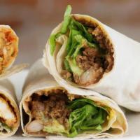 Philly Steak & Cheese Wrap · Sliced steak with grilled onions, green peppers and Swiss cheese