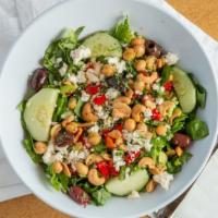 Mediterranean Salad · Romaine lettuce, feta cheese, roasted red peppers, chickpeas, parsley, olives, cashews and c...