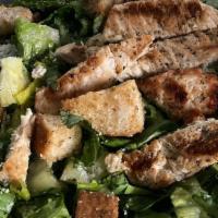 Chicken Caesar Salad · Romaine lettuce, croutons, parmesan cheese, Caesar dressing, tomatoes, green peppers, and a ...