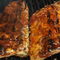 Full Slab Bbq Baby Back Ribs · Served with bread and choice of two sides.