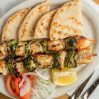 Chicken Kebob Dinner · Served with bread and choice of two sides.