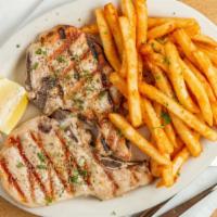 Pork Chop Plate Dinner · Served with bread and choice of two sides.