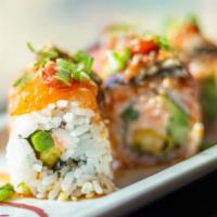 Oishii Maki Roll · Hot & spicy. Crab cake, fried shrimp, fried asparagus, avocado, spicy sauce, topped with sea...