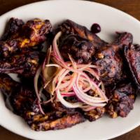 6Ct Blueberry Bbq · Tossed in house-made Blueberry BBQ & Pickled Red Onion