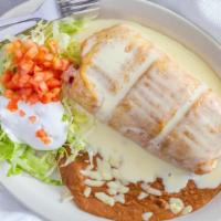 Chimichanga El Morral · One giant chimichanga fried or soft stuffed with steak, grilled chicken, shrimp, onions, bel...