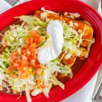 Enchiladas Supremas · One cheese, one chicken, one beef, one bean topped with lettuce, tomato, and sour cream.