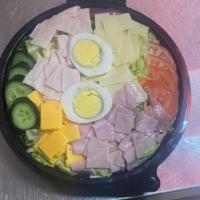 Chef · Mixed greens, tomatoes, onions, cucumber, ham, turkey, American, and Swiss cheese. Topped wi...