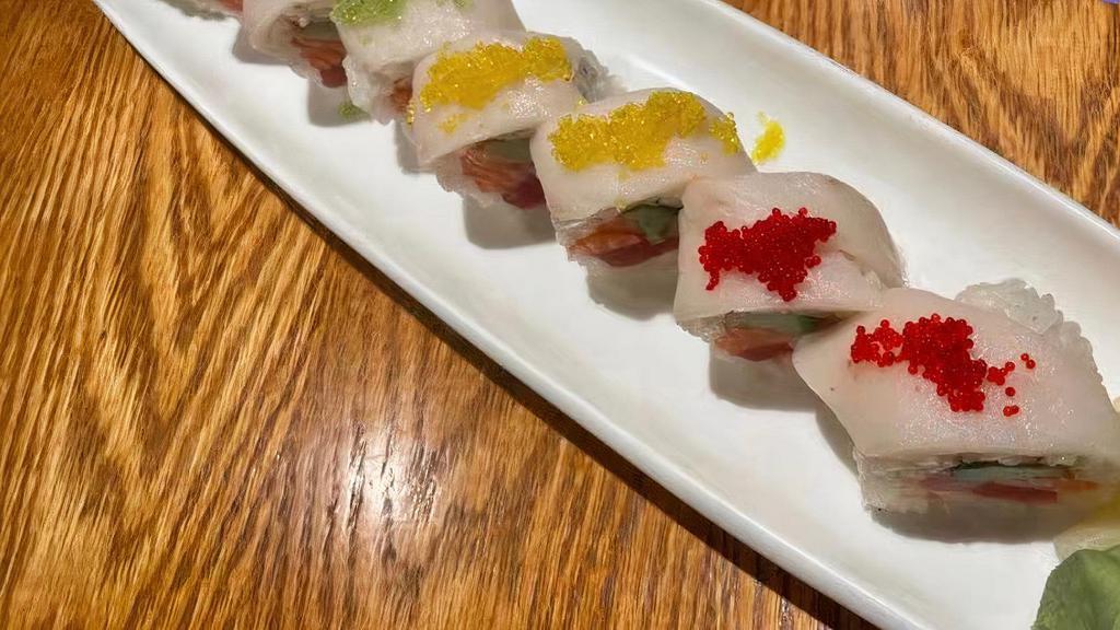 Perfect Roll · Salmon, tuna, yellowtail, and avocado wrapped in soybean paper. Topped with white tuna and rainbow tobiko.