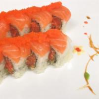 Sunshine Roll · Spicy tuna and avocado inside. Topped with salmon and masago.