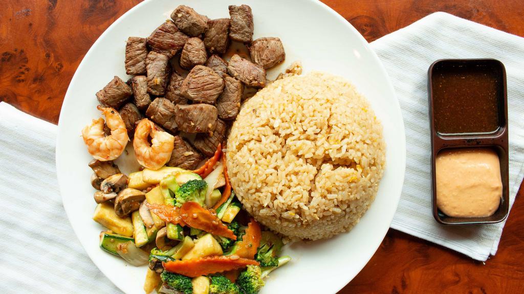 Hibachi Sirloin Steak · Includes clear onion soup or house salad. Two (2) piece shrimp appetizer, and fried rice. Served with hibachi veggie, ginger, and Yum sauce.