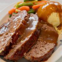 Meatloaf Dinner · Served with mashed potatoes and veggies.