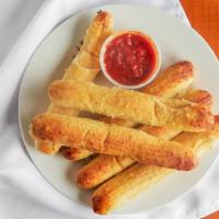 Cheesy Garlic Breadsticks · Six of crispy tender garlic bread sticks covered in melted mozzarella cheese. Served with a ...