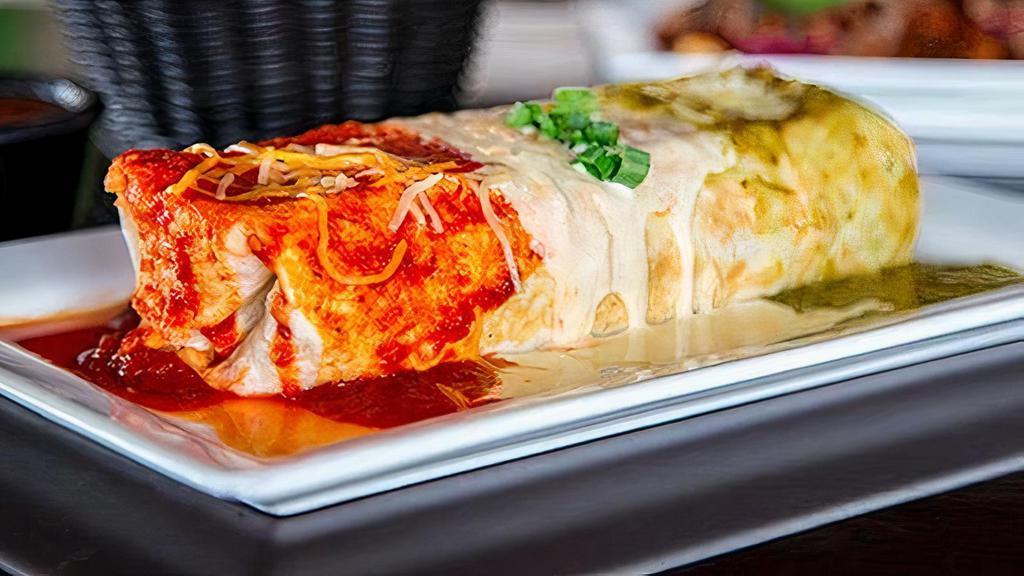 Queso Blanco Wet Burrito · With your choice of meat. All burritos are stuffed with rice, black or refried beans, lettuce, tomato, and sour cream inside. Low carb - all our burritos are available without tortilla.