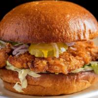 Breaded Pork Tenderloin · butterflied pork loin, seasoned bread crumbs, lettuce, shaved onion, dill pickle, mayo, yell...