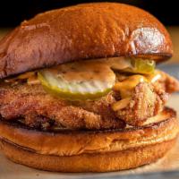 Fried Chicken · buttermilk brined fried thigh, dill pickle, maple chipotle mayo, buttery bun.