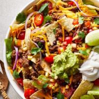 Taco Salad · mixed greens, seasoned beef, black beans, cherry tomato, shredded cheddar, red onion, roaste...