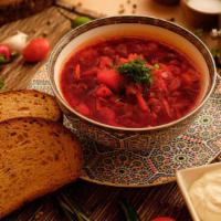 Borsch · A delicious & hearty Russian beet soup, with
a fresh variety of vegetables, served with sour...