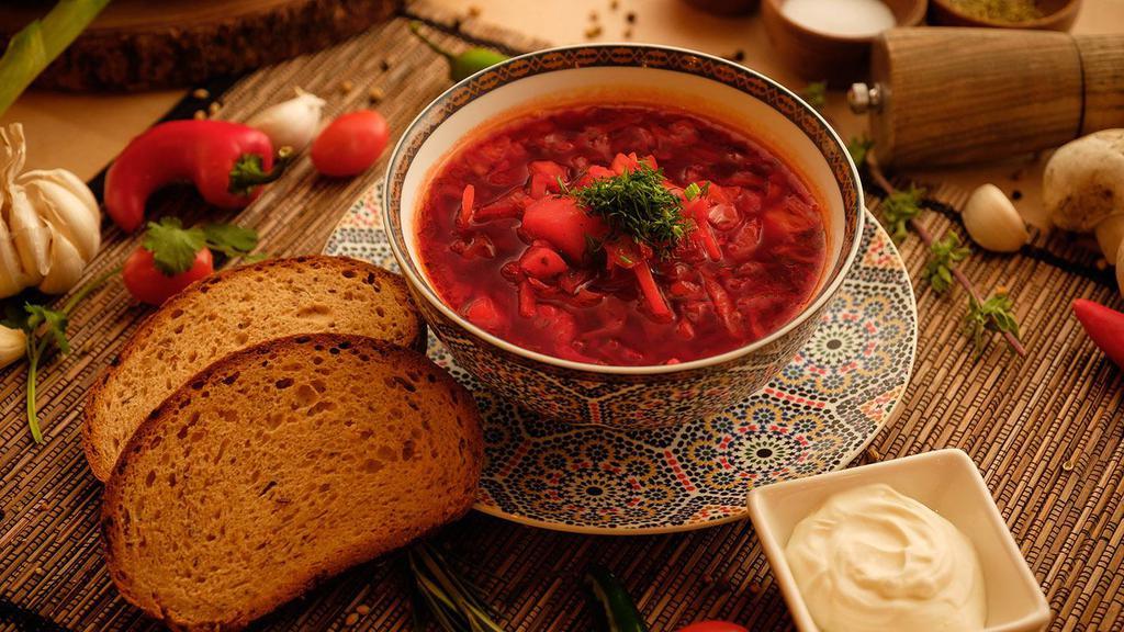 Borsch · A delicious & hearty Russian beet soup, with
a fresh variety of vegetables, served with sour
cream.