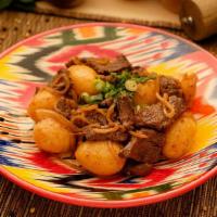 Kuurdak · Ancient Kyrgyz dish. Perfectly seasoned sauteed meat of your choice, with onions and roasted...