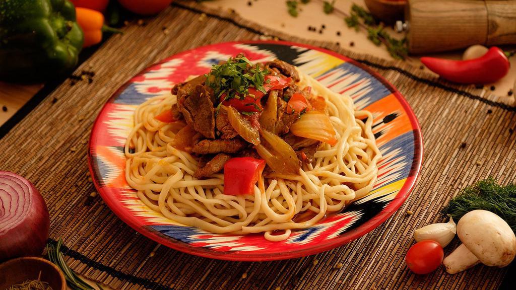 Boso Lagman · Beef and vegetable stew pan seared with
noodles.