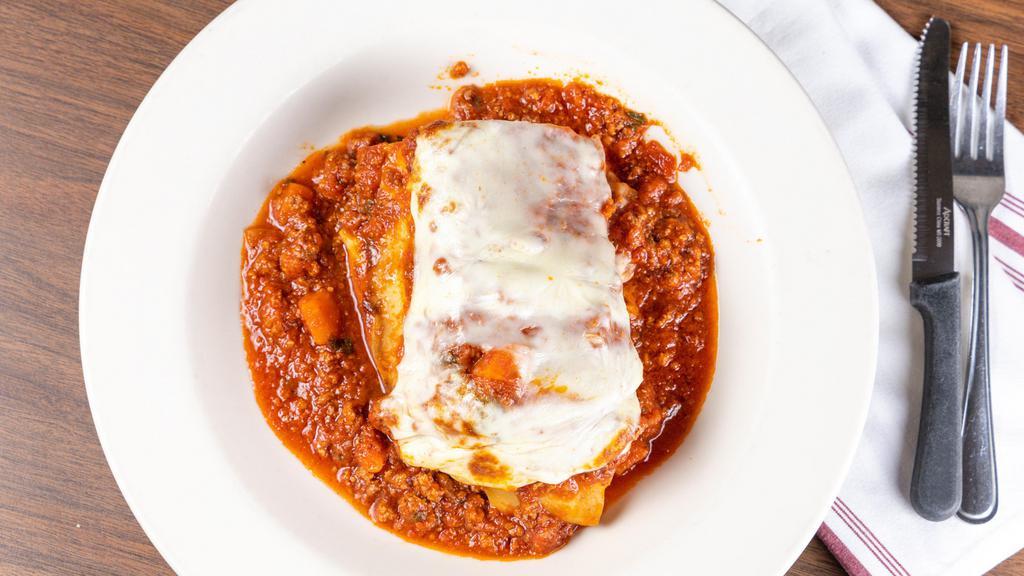 Lasagna · Homemade, ground beef, ricotta, fresh mozzarella, tomato sauce