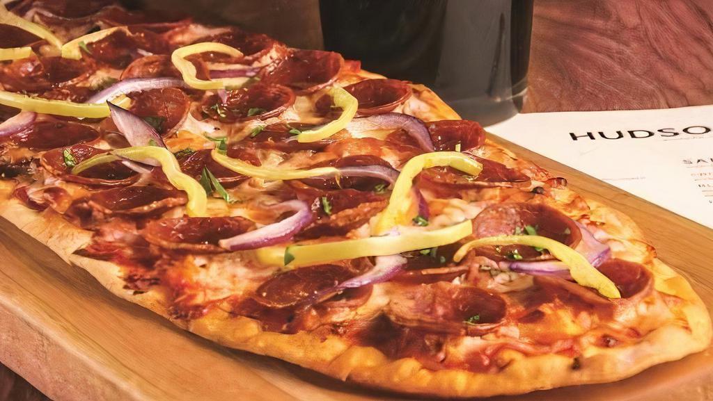 Pepperoni · Red onions and banana peppers.
