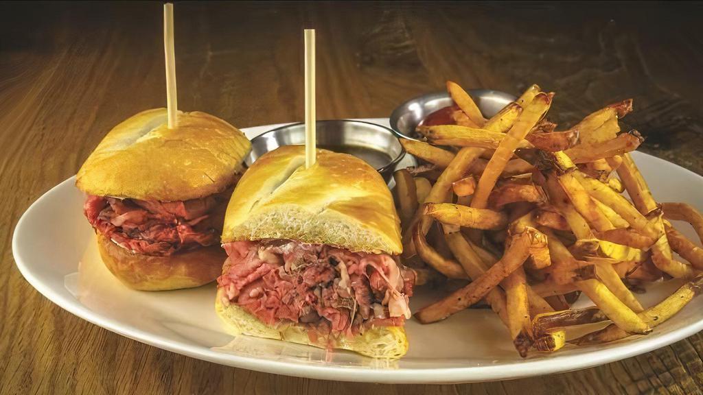 French Dip · Thinly sliced prime rib, French roll, horseradish cream, and au jus.