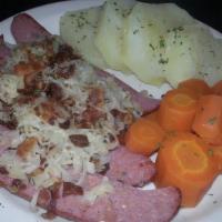Corned Beef Hash & Eggs · Two  eggs with corned beef hash, toast, and jelly.